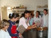 BOL girls making the food for widows and the elderly people